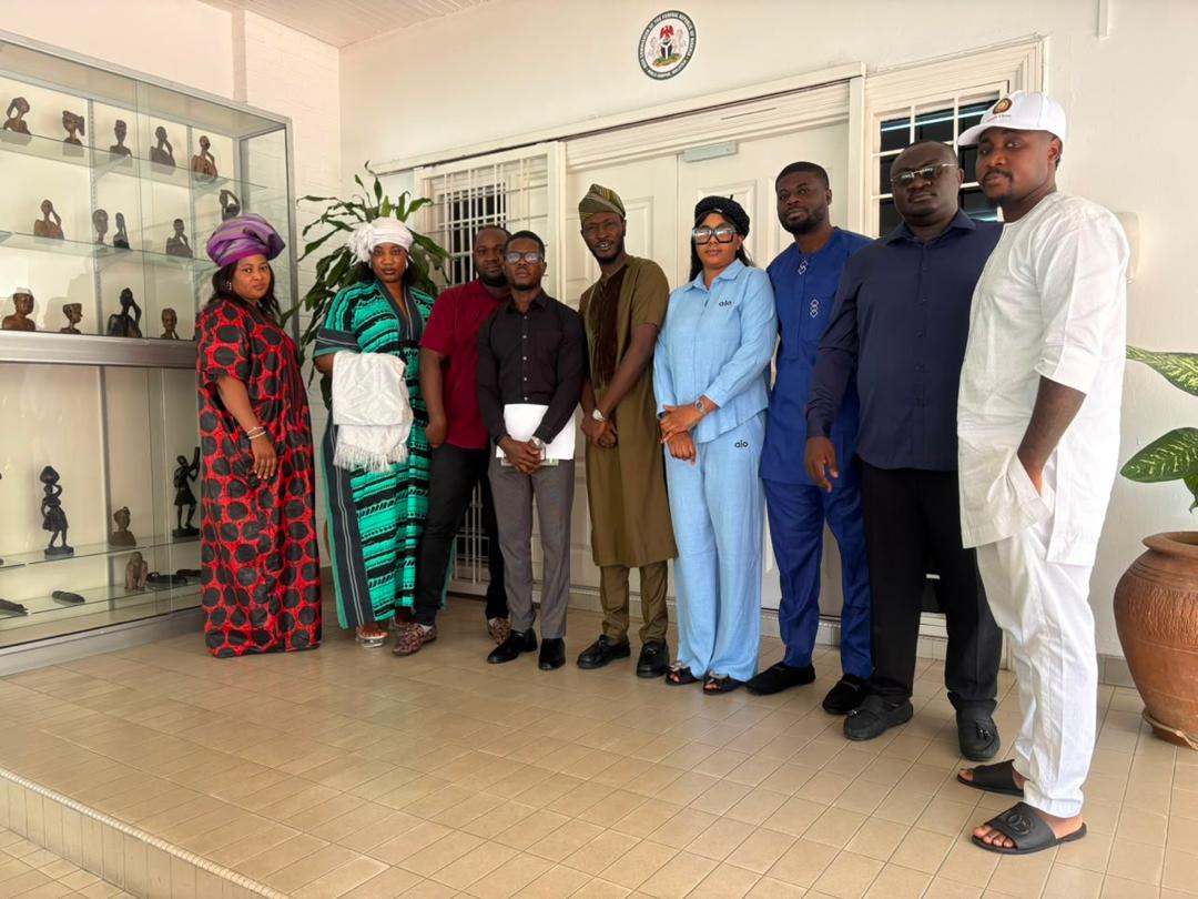 Members standing together indoors